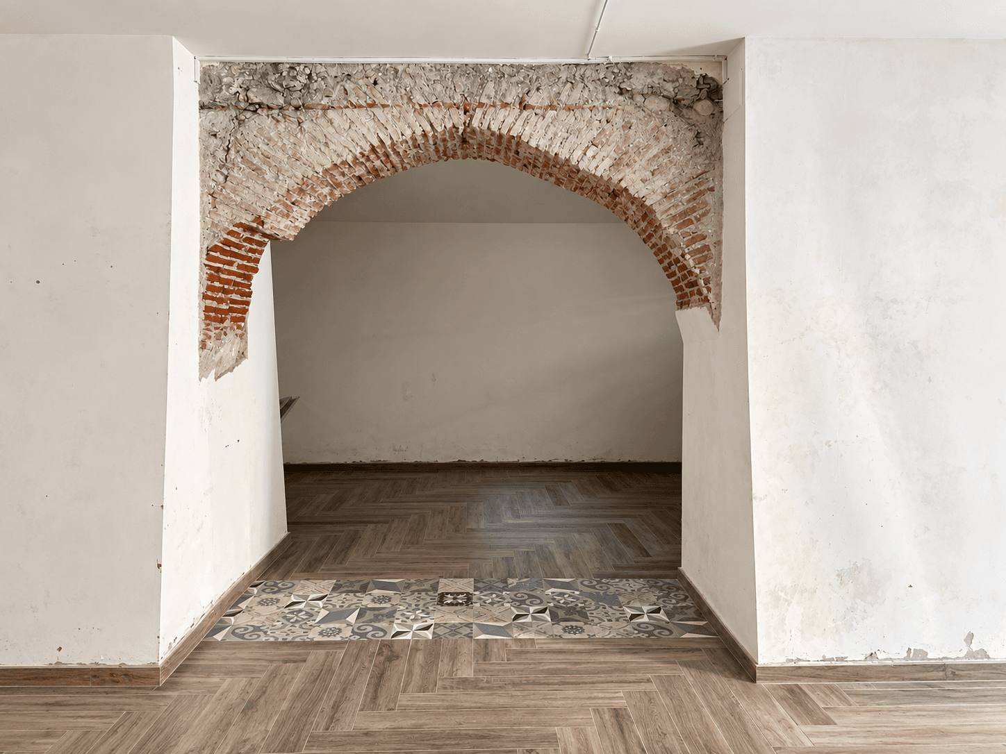 Locale commerciale con arco in mattoni a vista – Via Giuseppe Garibaldi